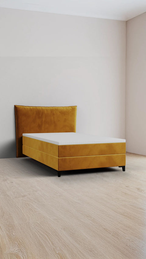 Yellow single boxspring bed 140x200 cm