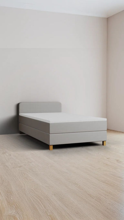 Beige single boxspring bed 90x220 cm