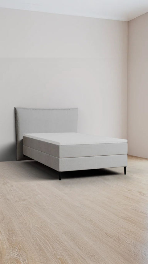 Light grey single boxspring bed 90x220 cm