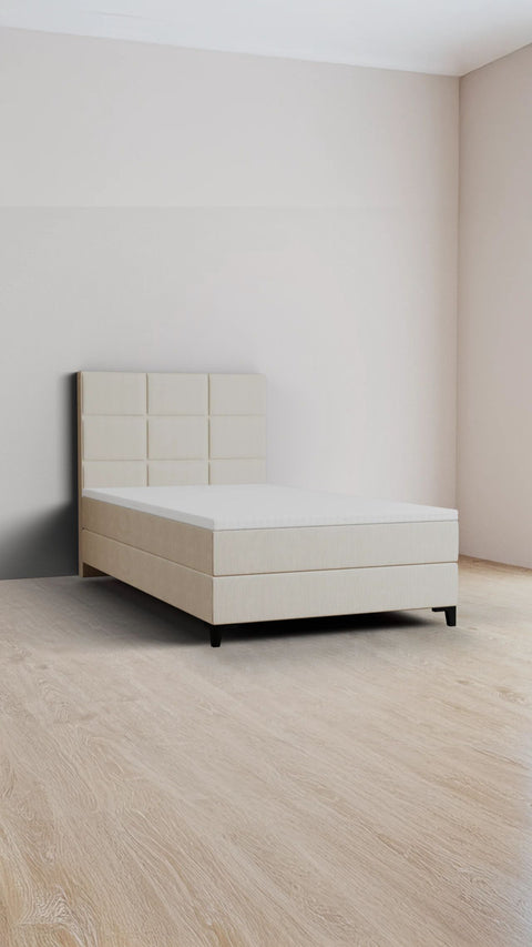 Beige single boxspring bed 140x200 cm